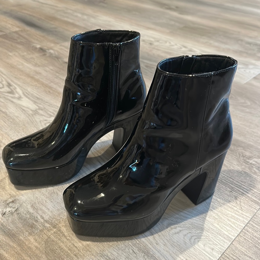 Worn once. Platform patent booties. Comfortable